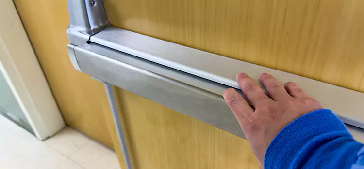 Installing a Push Bar on a Door Soledad